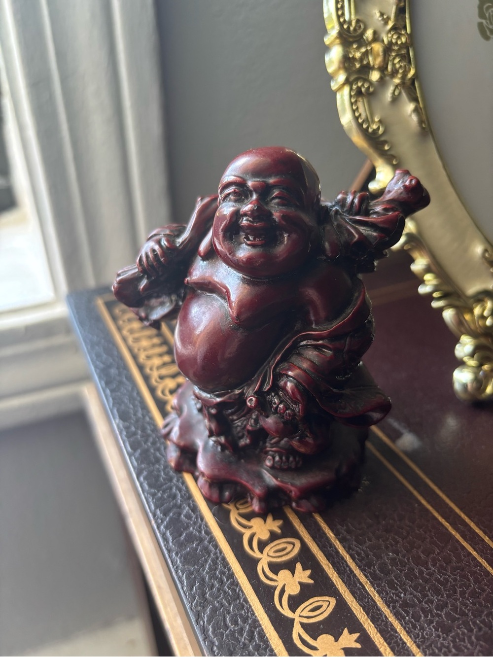 Vintage Red Resin Traveling Buddha Figure
